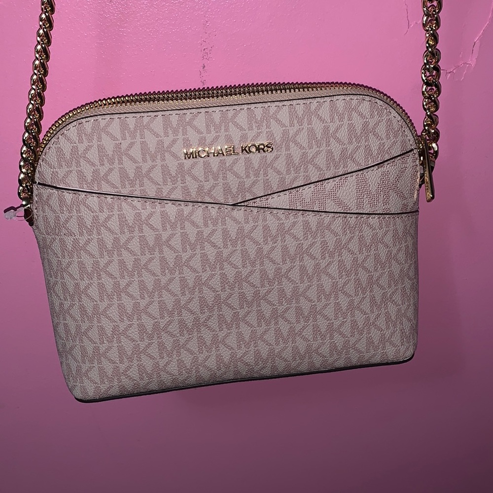 Med size micheal kors bag .
